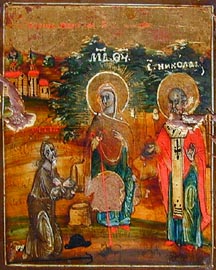 sexton George Iuruish kneels before the Theotokos with Holy Nicholas the Wonderwork beside her. 1850 Wood, tempera on gesso, varnish, gold.
